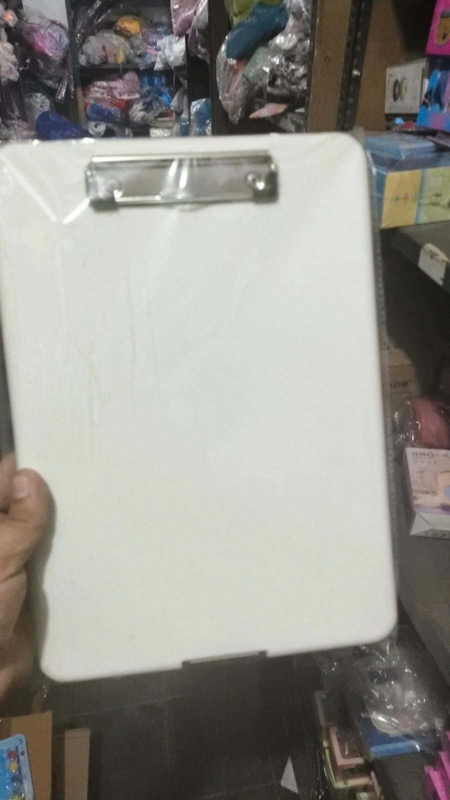 Exam board with storage